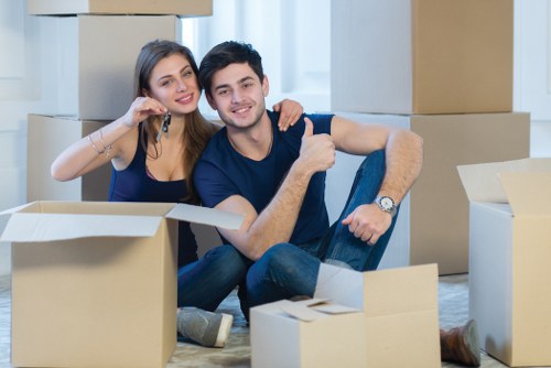 A flat removal team preparing furniture for a move in Tufnell Park
