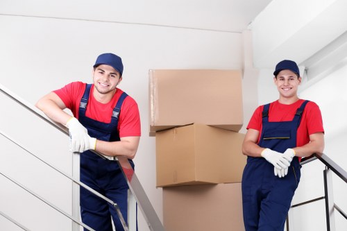 Furniture pick-up team handling a sofa removal in a Tufnell Park flat