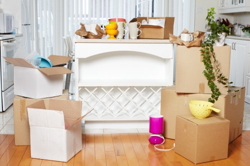 Unpacking boxes in a Tufnell Park flat after moving day