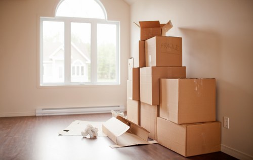 Furniture being moved through a typical Tufnell Park property with narrow access