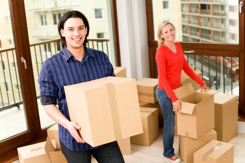 Packed boxes and furniture ready for local removals